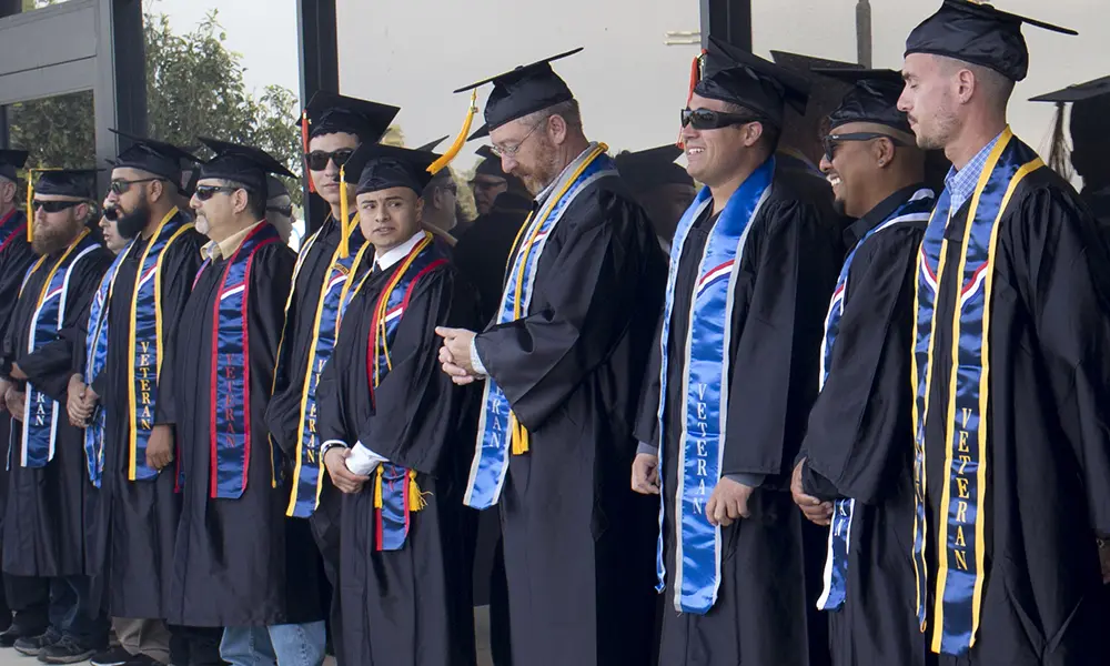 Graduates in cap and gown