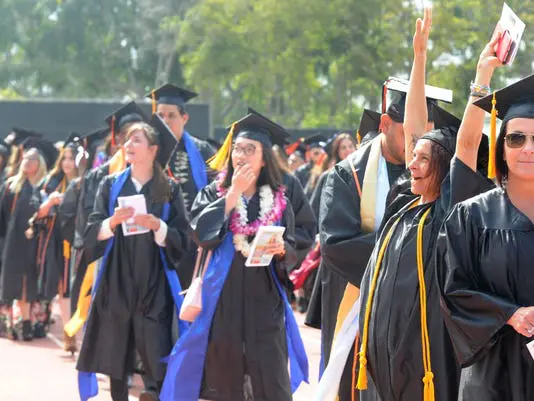 Graduates in cap and gown